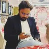 M Raza