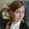 MELANIE BUDZISZ