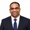 Er MILIND DALVI
