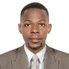 JOHN SSEMWOGERERE