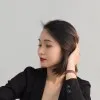 Thi Le