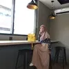 Dina Purnamasari