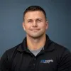 Travis Oelker