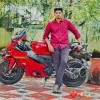 PURUSHOTHAMAN