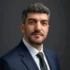 H Emre Oezcan