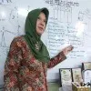 Dra Siti Syamsiah MM MPd