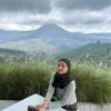 Tania Sari Santosa