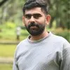 Mathew KM