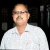 Prof Singh