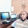 PETER AWOLESI