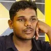 K DHINESH