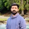 M Raza
