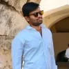 Y RAVITEJA
