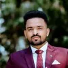 DHIMILS THOMAS