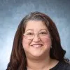 KIMBERLY CORMAN