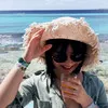 Luqing Huang