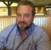 David “Chris” Rhom