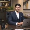 M Raza