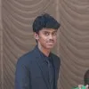 Nikhil John Thomas