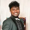 Avinash E