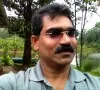 TOMY KURIAN