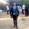 SIMON GITAU