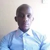 JOHN KAMAU