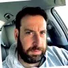 E Adam Levy