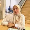 Alfira Ginting SIKom