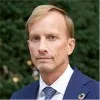 The Honorable Mark Dybul