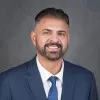 PAUL MUNIZ
