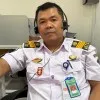 Mangasi Hasiholan Sinaga